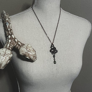 The Peridot Snake Talisman